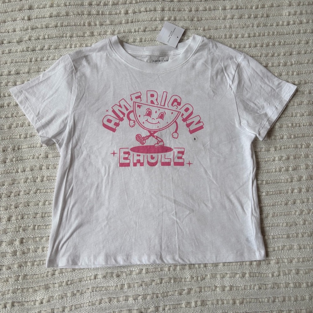 NWT American Eagle White Classic Smiling Graphic Pink Tee Shirt Size Small